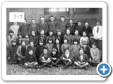 Class group unknown year. George Anderson. 3nd row: Croline Anderson, Isobel MacKinnon, Mary Gallie. 2nd row: Adra Munro, Mairi Birnie (nee McIver), Sybil Campbell nee Miller, Peggy Mackinnon, Phemie Urquhart, Mary Anderson.   Sandy Jack, John Anderson
