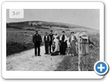 Flowerburn House in background. William Grigor, ?, Donald Grigor, ?, Mrs Catherine Grigor, Katie Grigor, ?, Kitty Whyte
