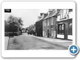 Fortrose High St to west. Bert Miller's van (butcher) visible. Union Tavern on right